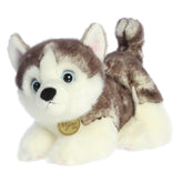 A Siberian Husky puppy plush toy from Miyoni Tots by Aurora with gray and white fur and bright blue eyes.